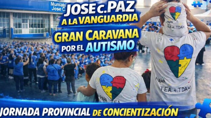 Familia abrazada con remeras de corazones de colores en el Polideportivo Municipal de José C. Paz durante la jornada provincial de autismo y concientización TEA.